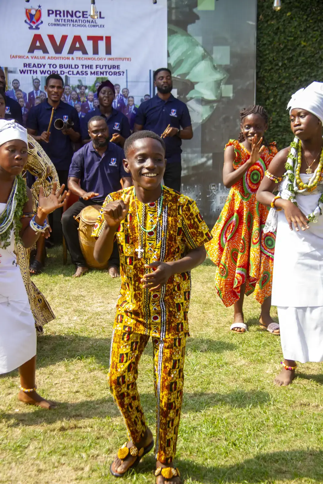 A member dancing at the centre of the group during the cultural display.
